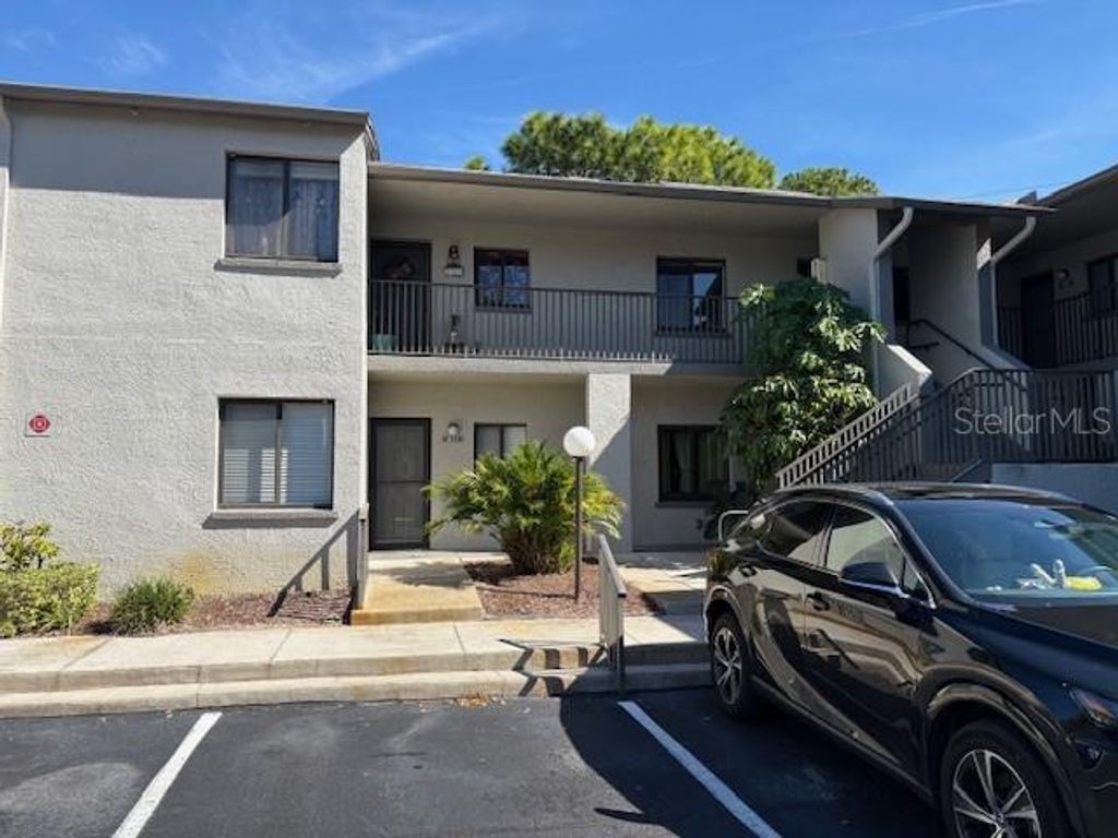 Photo of 2388 Lake Heather Heights Court #104, Dunedin, FL 34698 (MLS # TB8446277)