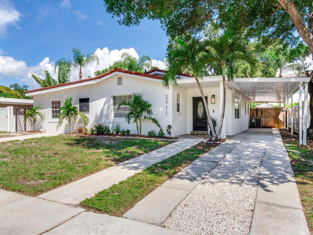 Photo of 2911 W Winthrop Road, Tampa, FL 33611 (MLS # TB8546415)