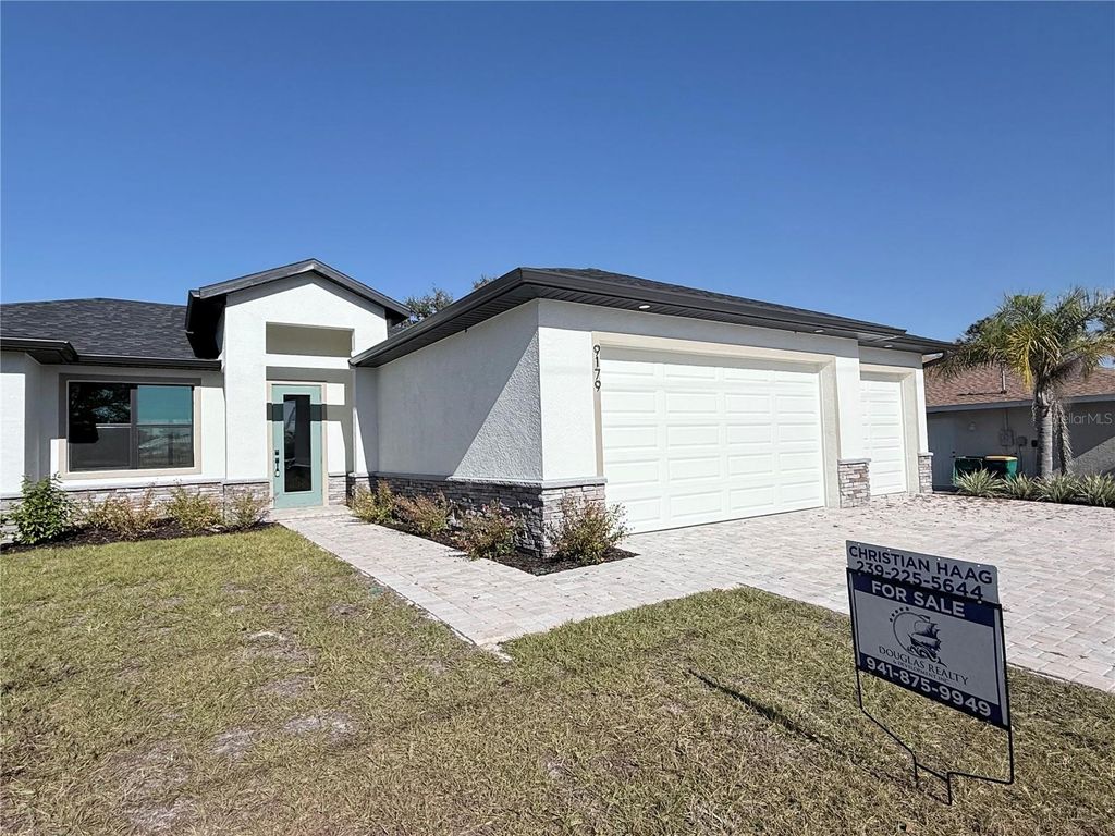 Photo of 9179 Ravel Street, Port Charlotte, FL 33981 (MLS # C7523321)