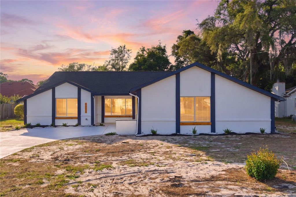 Photo of 1215 Waterfall Drive, Spring Hill, FL 34608 (MLS # TB8501932)