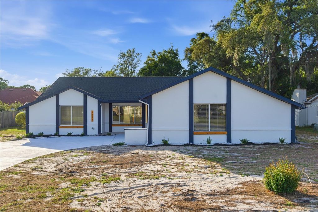 Photo of 1215 Waterfall Drive, Spring Hill, FL 34608 (MLS # TB8501932)