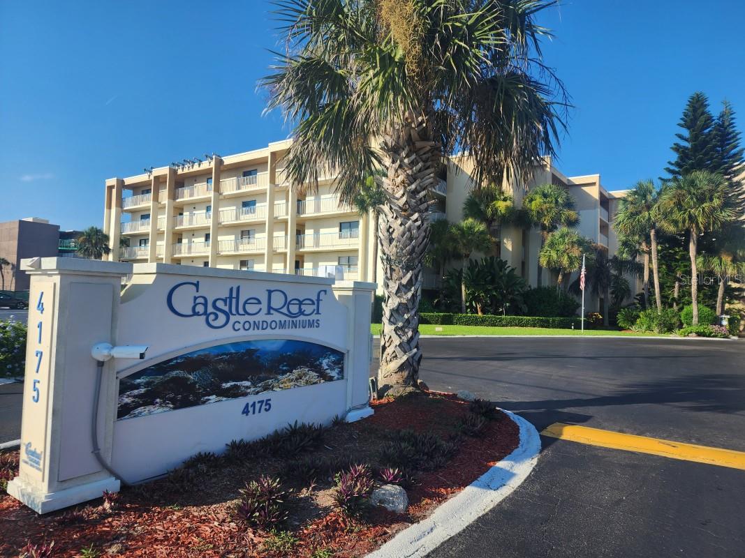 Welcome to your completely renovated seaside sanctuary on the no-drive beach! This immaculate home features crown molding, plantation shutters, and luxury vinyl flooring. Your custom-designed kitchen includes a gorgeous, extended quartz countertop, shaker style cabinets, stainless steel appliances, under cabinet lighting, and multiple custom storage features all creating an elegant and practical entertaining space. The luxury continues in both fully renovated bathrooms with custom vanities, quartz countertop, and porcelain tile. The master closet with raised ceiling allows for the perfect place to store all your tall beach toys! Even the air conditioner and electric panel are new. Your top floor balcony offers a stunning view of the beach and the lush grounds unique to Castle Reef. Enjoy the resort-like amenities of a large, heated ocean-front pool, kiddie pool, clubhouse with kitchen & gas grills, gazebo, shuffleboard and tennis/pickleball. Dining & shopping are a short walk away.