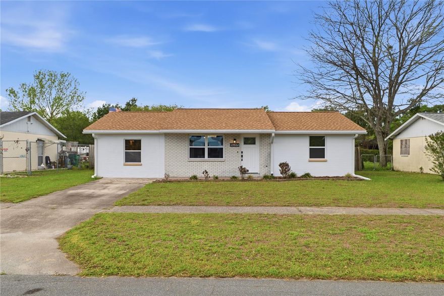 This cozy 3-bedroom, 2-bath home with 1,144 sqft is located in a quiet neighborhood with no HOA or CDD, it is conveniently close to shopping, schools, medical facilities, major highways, Wiregrass Mall, Busch Gardens, and Tampa Airport. It features a split floor plan, a New Roof, and freshly painted interior and exterior. Recent updates include new flooring and updated kitchen cabinets and countertops (2021). The primary bedroom offers extra space for a home office. Enjoy a screened-in patio, a fenced backyard with plenty of room for pets, and additional space for storage.