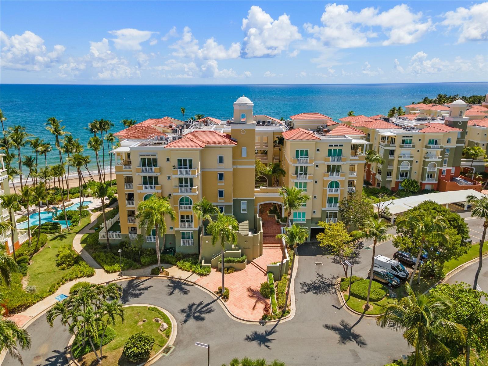 Immerse yourself in the epitome of refined living with this majestic penthouse at The Marbella Club, an enclave of unparalleled prestige within the illustrious Palmas del Mar resort in Puerto Rico. This corner penthouse is a masterpiece of design and sophistication, offering a sanctuary of serenity and luxury with four generously proportioned bedrooms and four elegantly appointed bathrooms. Each space within this residence has been thoughtfully remodeled to feature modern, clean finishes that echo the allure of the surrounding seascape. The soaring ceilings and expansive living areas are bathed in natural light, accentuating the meticulous attention to detail and the seamless blend of indoor and outdoor living. Perched in a commanding beachfront position, this residence affords its inhabitants breathtaking views of the ocean, delivering a sense of exclusivity and privacy that is rare and coveted. The corner unit's unique vantage point invites an abundance of natural light, creating an ambiance that is both uplifting and tranquil. Residents will enjoy direct access to the pristine beach, providing an idyllic backdrop for relaxation and rejuvenation. The Marbella Club, a gated sanctuary within the vibrant Palmas del Mar community, is renowned for its exceptional suite of amenities. It offers a lifestyle of leisure and luxury, with two resort-style pools, a soothing hot tub, a state-of-the-art fitness center, and an exclusive wine cava for intimate gatherings and tastings. The community's commitment to comfort and convenience is evident in its inclusion of modern elevators and reliable power generators, ensuring peace of mind for all residents. Palmas del Mar itself is a bastion of luxury living, with amenities that cater to every conceivable desire. From championship golf courses and professional-grade tennis courts to equestrian trails and a full-service marina, the resort facilitates a lifestyle that is both active and indulgent. Dining options range from casual cafes to gourmet restaurants, offering a culinary journey that is as diverse as it is delicious. Not to be overlooked, The Palmas Academy provides exemplary educational opportunities within this exclusive community, making it a haven for families seeking a life of luxury and learning. This penthouse at The Marbella Club represents more than just a home; it is a statement of luxury, a retreat that promises a lifestyle of unparalleled sophistication and tranquility. It is an invitation to live life at its most opulent, nestled in the heart of one of Puerto Rico's most sought after resort communities. For the discerning buyer seeking a haven of elegance and exclusivity, this residence is without equal.