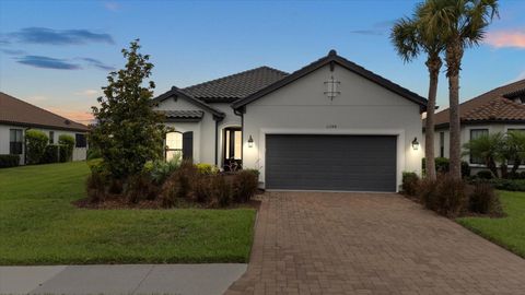 Photo of 11398 Juglans Drive, Odessa, FL 33556 (MLS # W7875778)