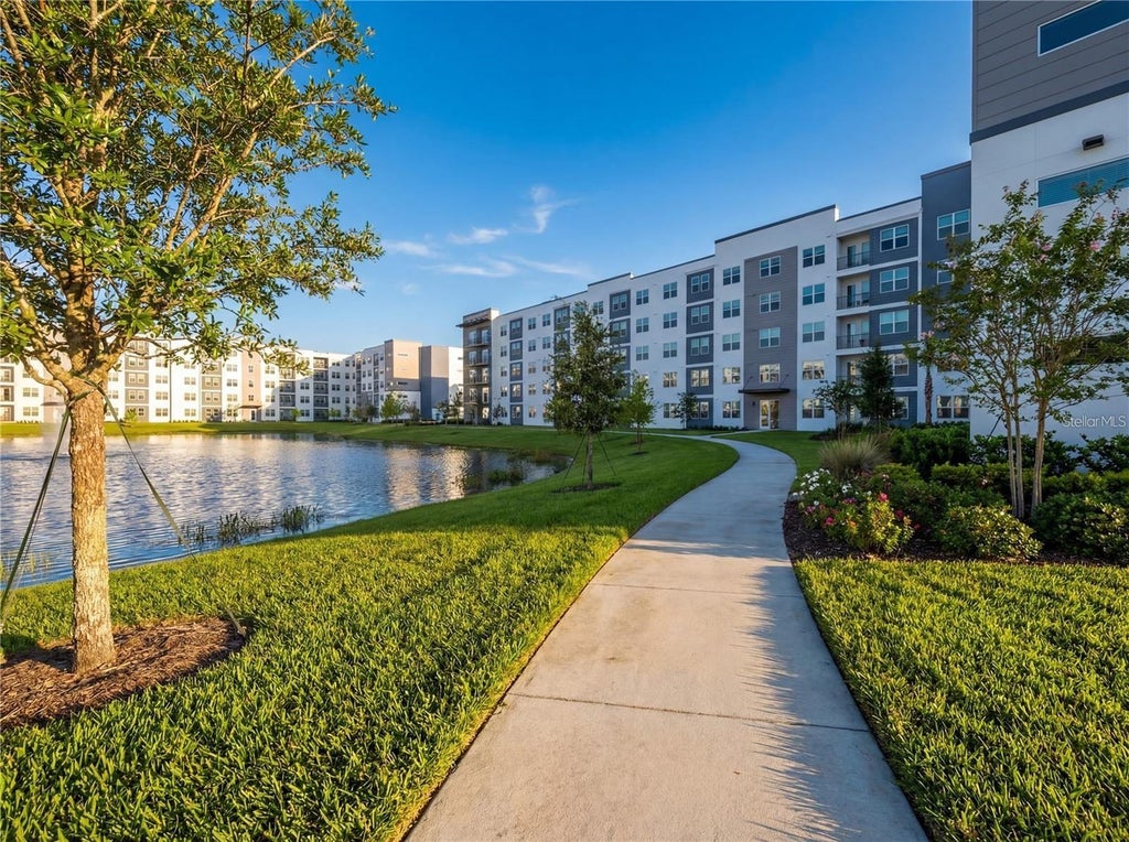 Photo of 5579 Millenia Park Boulevard #515, Orlando, FL 32839 (MLS # O6413821)