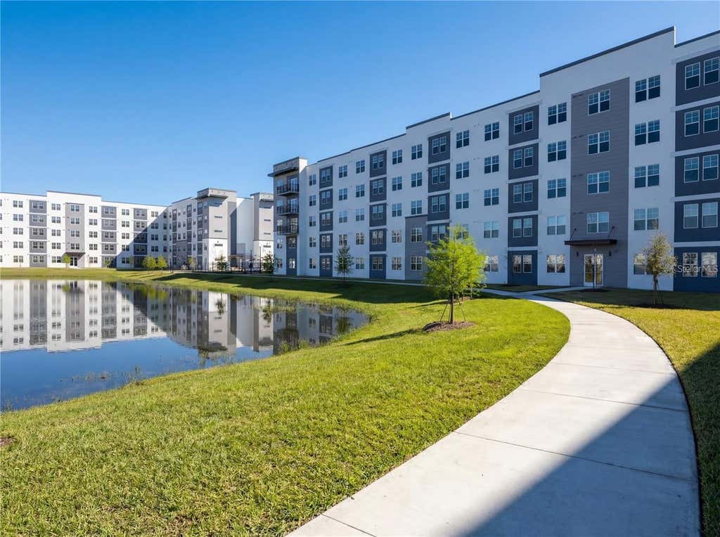 Photo of 5579 Millenia Park Boulevard #515, Orlando, FL 32839 (MLS # O6413821)