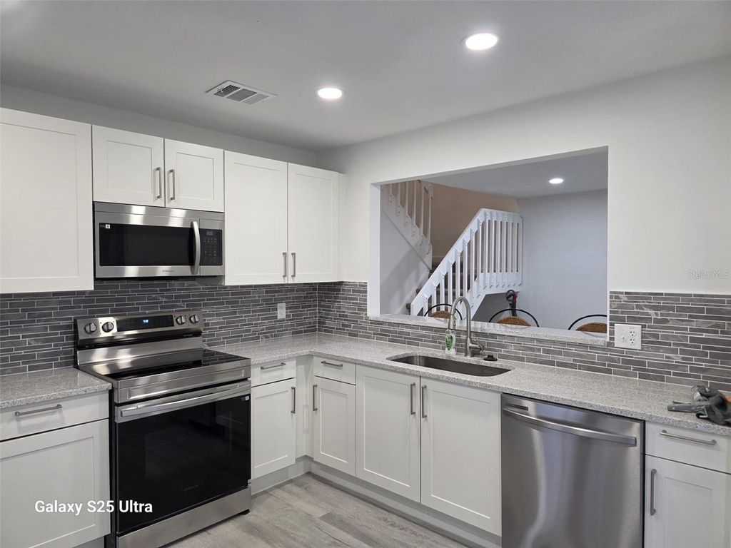 Photo of 4402 Ring Neck Road #19B, Orlando, FL 32808 (MLS # O6385829)