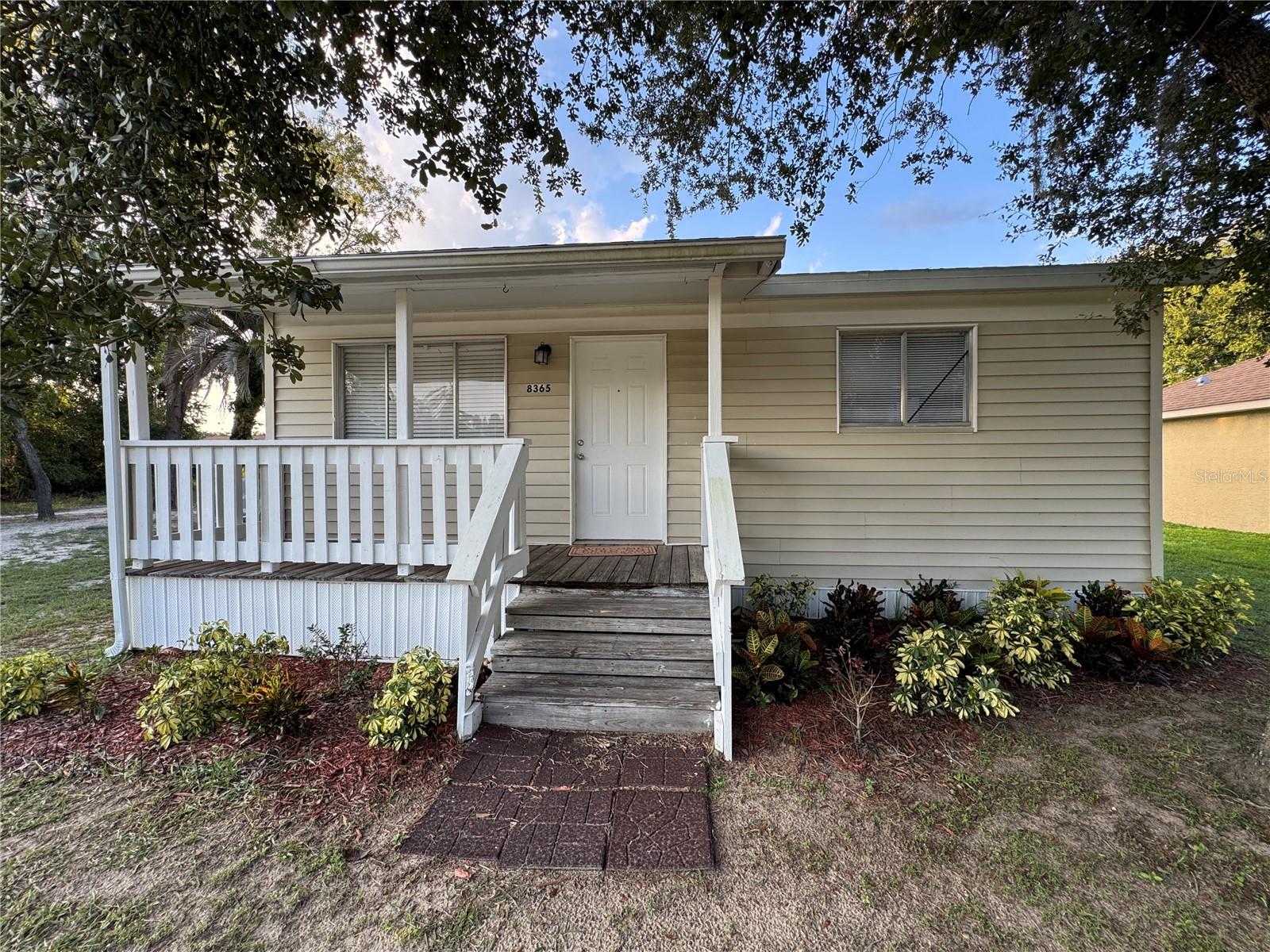 Charming Starter or Investment Opportunity – Priced to Sell! Welcome to this cozy 2-bedroom, 1-bath home situated on a spacious .22-acre lot offering room to grow or simply enjoy a bit more breathing space — with no neighbor to the left for added privacy. With 672 square feet of efficient living space, this property is ideal for first-time buyers, investors, or those looking to downsize and simplify. Recent updates include a brand-new roof and recently serviced septic system, giving you peace of mind for the essentials. Step out onto the front balcony to enjoy your morning coffee or take in a bit of fresh air. The property has a straightforward layout with potential to personalize or improve over time. Located in a quiet area with no HOA, this home offers a rare chance to own land without extra hassle. Affordable, low-maintenance, and ready for its next chapter — come see the potential today!