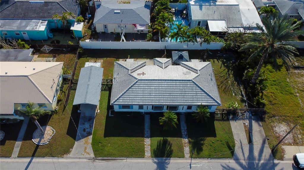 Photo of 245 145th Avenue E, Madeira Beach, FL 33708 (MLS # TB8488458)