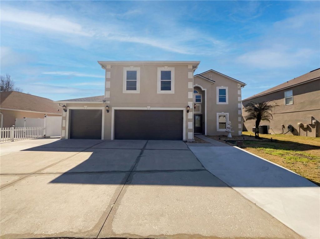 Photo of 8286 Settlers Creek Loop, Lakeland, FL 33810 (MLS # O6383314)