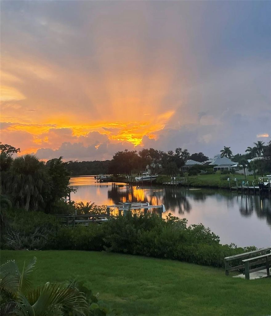 Build your dream home on this magnificent property that has Gulf access and beautiful wide views of Shakett Creek. 3 miles to the Gulf! Straight shot to the Venice Jetty! Prime boating area!  This unique property has a boat dock and 7,000 pound boat lift with electric, built in 2007.  This maintained and nicely landscaped lot has a circular driveway and is located on a dead-end street of a residential area. Sunset colors on the bay are gorgeous every night! Paddleboard and canoe right from your dock! There are not many boating water-access properties for sale anymore, so hurry up and get yours today! Close to our beautiful beaches, shopping, dining and easy access to Venice and Sarasota. Well is in good condition. Needs a septic.