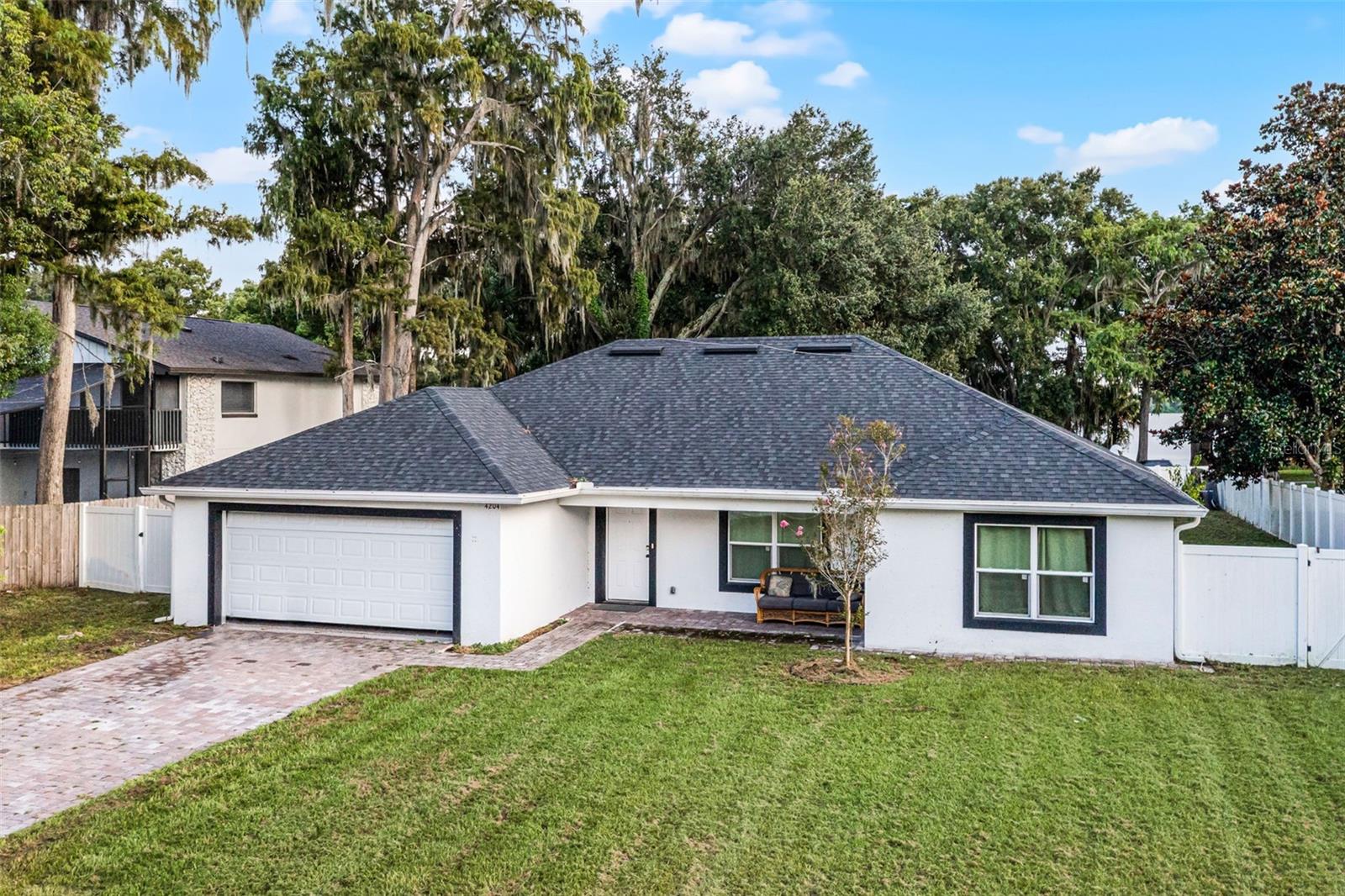 Welcome Home! Check out this newer built 4bedroom 2 and a half bathroom home sitting on over 1/3 acre! The property is
currently tenant occupied, the fence between the patio & backyard will be removed prior to closing. As soon as you pull up to the
cul-de-sac you'll be greeted with a long drive & yard space. Walking into the front door you'll notice the newer luxury vinyl flooring
throughout and an open layout, featuring a Kitchen, living room and dining room combination. Every entertainer's dream! The
kitchen features beautiful white cabinets & white quartz countertops and ample countertop space. This home features a split
floorplan with the master bedroom being on the opposite side from the rest of the bedrooms. The master bedroom features a
spacious master bathroom with two sinks and a beautiful walk in shower as well as a spacious walk in closet. This home features a
beautiful spacious backyard, if you would like to remove the fence you have a beautiful view of Lake Orlando! The roof, electrical,
plumbing & Ac all are only two years old! All that is left is for you to move in and unpack your bags! Please reach out to the listing
agent today to schedule your showing!
