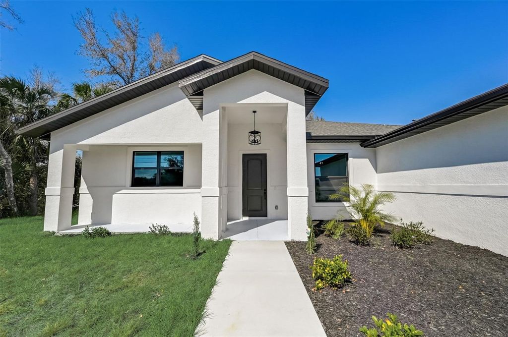 Photo of 3850 Skyway Avenue, North Port, FL 34288 (MLS # A4672339)