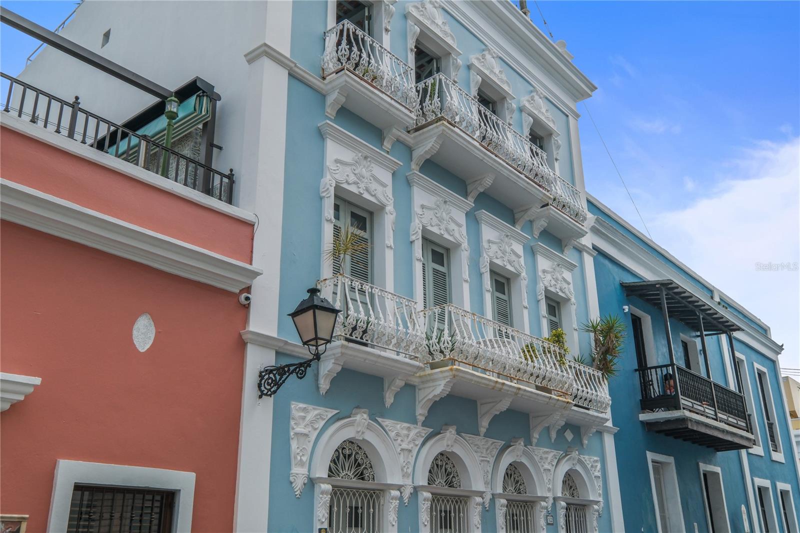 Rare penthouse in the heart of historic Old San Juan, located on the 3rd floor of an exclusive 3-unit building, offering 1,521 sq. ft. of interior living space plus a deeded 1,226 sq. ft. private rooftop terrace — a true extension of the home. The apartment features 2 bedrooms, 2 original Art Deco bathrooms, a spacious living room with three private balconies, an office area, and a fully equipped kitchen, fully furnished with West Elm pieces and completely equipped as a move-in ready unit. Just one floor up, the private rooftop terrace is a beautifully designed retreat with a casita that includes a full bathroom and wet bar, fully tiled floors, integrated drainage for water control, ambient lighting throughout, and an automated watering system for the lush tropical plants. The terrace is furnished with a large L-shaped sofa, dining table for six, a smaller breakfast nook, and plenty of open space for entertaining or relaxing under the Caribbean sky. The boutique building ensures privacy and security with only three units, allowing one-year or longer leases while prohibiting short-term rentals to preserve the integrity and character of the property. This Old San Juan penthouse seamlessly blends historic charm, sophisticated design, and modern comfort, offering one of the most spectacular private terraces in the city and a fully equipped, move-in ready home ideal for immediate enjoyment.