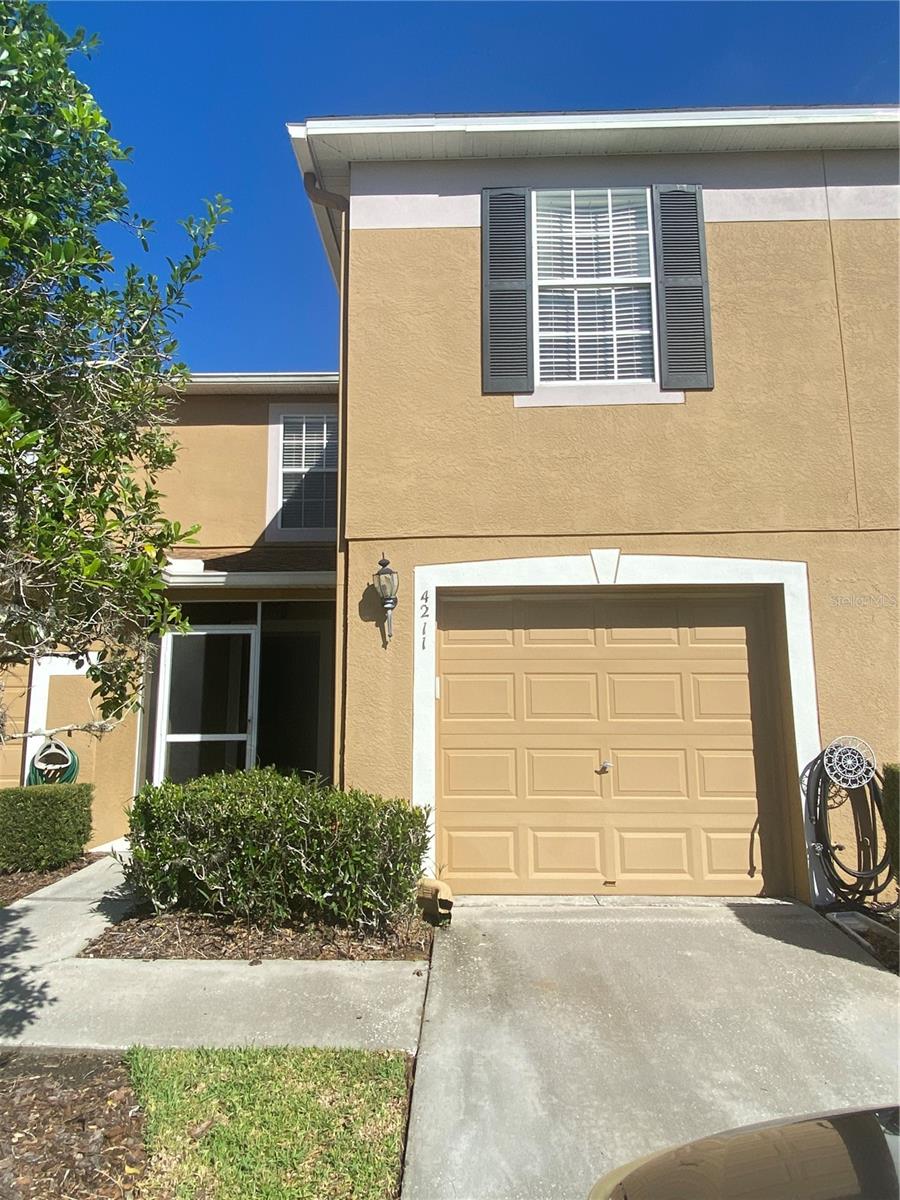Brand new tile downstairs and brand new carpet upstairs! This 3-bedroom, 2.5-bathroom townhome in the sought-after Edgewater Grand Oaks Community of Wesley Chapel offers style, comfort, and convenience. Enjoy brand new flooring throughout, brand new granite countertops, and brand new appliances. All bedrooms are tucked upstairs for privacy, along with a full laundry area to simplify daily tasks. Downstairs, the open-concept layout features spacious living and dining areas, a modern kitchen, and a convenient half bath—perfect for entertaining. Step outside to your screened back lanai and unwind with peaceful conservation views. A 1-car garage provides extra storage and covered parking. As a resident of Edgewater Grand Oaks, you'll also enjoy access to a sparkling community pool. Located near shopping, dining, and major conveniences, this townhome checks all the boxes. Don’t miss your chance to make it yours!