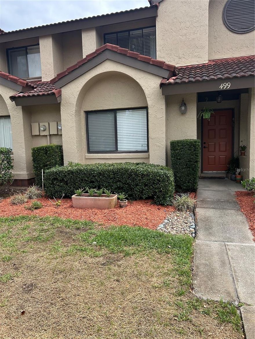 Beautiful 2 bedroom 2 bathroom townhome within The Highlands Community. The 20ft high ceiling in the Great Room gives this home a very open design with lots of natural light. Sliding doors lead out to a screened porch with separate locked storage space. Guest/2nd bedroom on the first floor with direct access to the 2nd bathroom. All appliances purchased New in 2022 and are included with sale. New A/C 2023. Upstairs flexible loft space makes for a nice home office. Large primary bedroom has beautiful laminate floors and plenty of closet space and updated bathroom. Two assigned parking spaces directly in front of your townhome makes coming home convenient. Cypress Club residents enjoy their own private community pool in addition to All Highlands amenities. They include Audibon Park with BBQ/Picnic Area, Playgrounds, Olympic Size Pool, Kiddie Pool, Nature Walking Trails & Tennis & Pickleball Courts and a Clubhouse. Zoned for highly rated Seminole County Schools with The Highlands elementary school located within the community. Nearby Cross Seminole Trail and Central Winds Park. Located close to 17-92, SR417, grocery stores, fitness clubs.