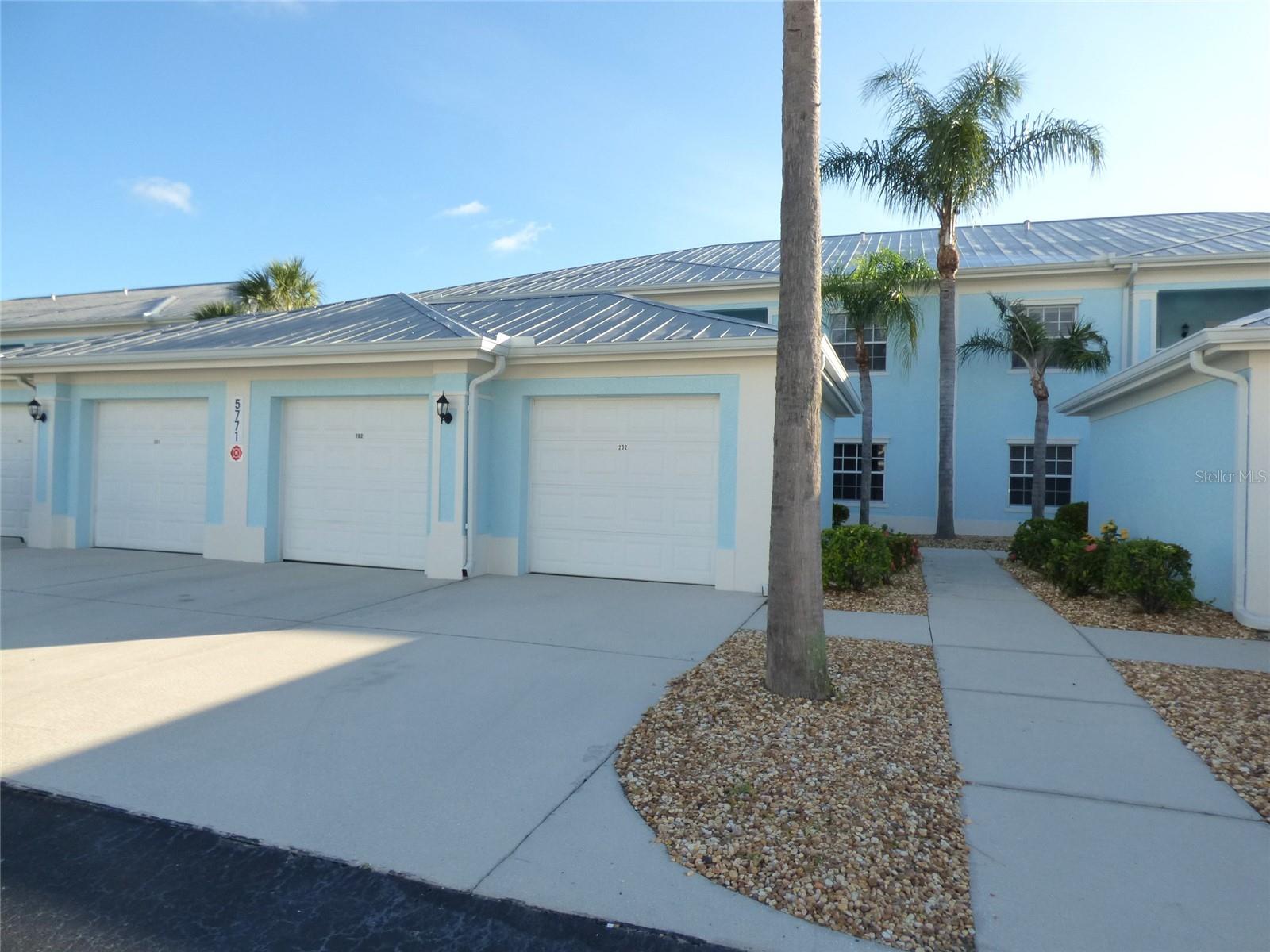 Spacious First Floor Condo with 2 bedrooms, 2 bathrooms, 1 car garage, Den/Office, Screened Lanai, and 1168 sf of living area in The Colony at Sabal Trace! Open floor plan that has been freshly painted, New Luxury Vinyl flooring with spacious bedrooms. Kitchen offers ample storage, pantry, and a breakfast bar. Stackable washer and dryer in unit. Screened lanai, private storage, and 1 car garage with automatic door opener & built in work bench & storage shelves. Enjoy living in this centrally located, gated, resort style community with a single clubhouse building containing a pool room, common room, kitchen, exercise room and bathrooms in two separate air-conditioned spaces. A swimming pool and fenced pool deck are attached on the southeast side of the clubhouse. The Condo is available immediately with a 1 year lease and a security deposit of $1650. Please call to schedule an appointment.