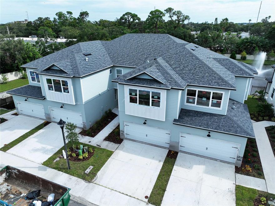 Brand new construction in the heart of Seminole! This beautifully designed 2-bedroom + loft, 2.5-bath townhome offers 1,534 sq. ft. of stylish living space with an open-concept floorplan and upscale designer finishes throughout. The spacious kitchen features 42” upper cabinets, stunning quartz countertops, a breakfast bar, eat-in kitchen space, and a separate dining area—perfect for both everyday living and entertaining. Luxury vinyl plank flooring runs throughout the first level, complemented by high ceilings that create a bright and airy feel. Upstairs, enjoy a versatile loft space ideal for a home office, media room, or guest area. The oversized 8’ sliding glass doors lead to a covered lanai overlooking a peaceful pond, creating the perfect spot to relax and unwind. Located in a quiet, tucked-away Seminole neighborhood, this home also includes a 1-car garage plus builder and manufacturer warranties for added peace of mind. Move-in ready and maintenance-friendly luxury living at its best!