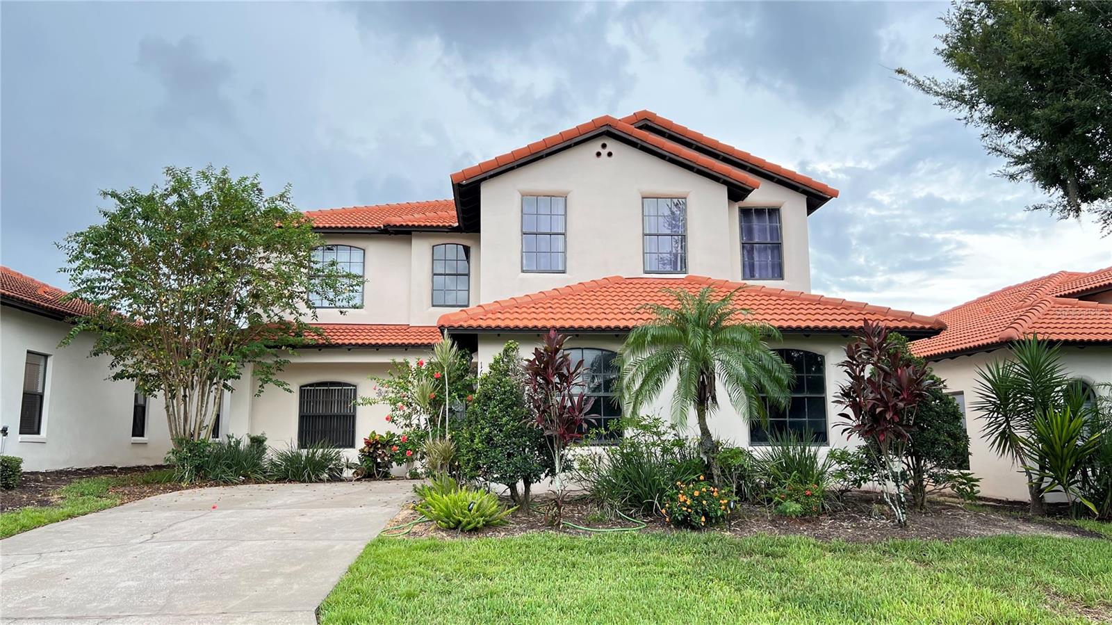Welcome to this gorgeous 6-bedroom, 4-bath furnished single-family pool home located in the upscale gated resort community of High Grove. With approximately 2,928 sq. ft. of living space, this Mediterranean-inspired residence showcases a classic red tile roof, beautiful brick-paved pool area, and a thoughtfully designed interior featuring tile and laminate flooring throughout. Enjoy the perfect Florida lifestyle with a private screened-in pool and spacious patio for entertaining or relaxing under the sun. The home comes partially furnished, with all appliances included, and even lawn care provided for your convenience. Ideally situated off Highway 27, the property is just 6 miles to I-4 (Exit 55), 1 mile to US Hwy 192, and only 10 miles to Disney. Shopping, dining, and entertainment—including Posner Park Mall—are just minutes away, offering both comfort and convenience. Whether as a primary residence, vacation retreat, or investment opportunity, this home provides resort-style living in one of Clermont’s most desirable gated communities. This home is beautiful and ready for you and your family. Schedule your showing today!