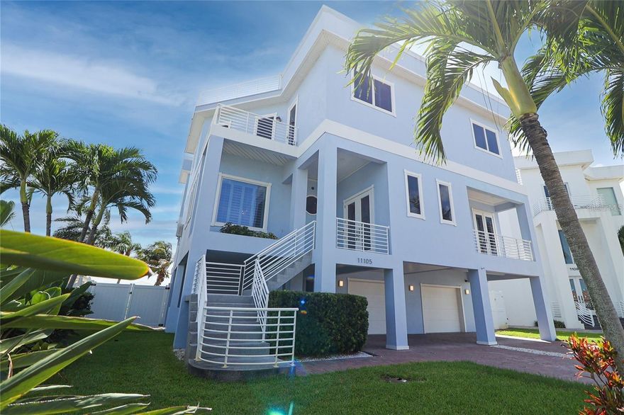 Boater’s & Entertainer’s Paradise! Waterfront Gem in Treasure Island, FL. Discover unparalleled luxury in this breathtaking waterfront home in the heart of Treasure Island, Florida. With captivating water views from every angle, this coastal masterpiece blends timeless elegance with modern flair, offering a lifestyle like no other. The heart of the home is an extraordinary kitchen that sets a new standard for luxury. Featuring a stunning floor-to-ceiling backsplash, a custom range hood, a Wolf gas range, and a Sub-Zero refrigerator, this space is as functional as it is beautiful. A beautiful bar with chilled drawers and a wine chiller make hosting effortless. Step onto the covered patio just off the kitchen to unwind with serene water views. Entertain in style in the formal dining room, adorned with exquisite woodwork and dazzling chandeliers. Need a quiet retreat? The versatile office/den delivers. The living room, with its soaring 30-foot ceilings, frames expansive water vistas, seamlessly connecting indoor luxury with outdoor beauty. An elevator ensures effortless access across the home. The primary suite is a haven of sophistication, featuring a custom walk-in closet and a spa-inspired bathroom that must be seen to be believed. Three additional bedrooms, two with private sunset-facing porches, offer comfort and charm. Outside, your private oasis awaits: a sparkling pool, a large dock with a 16,000-pound boat lift, jet ski lift, and space for a friend’s boat. Twin sundecks provide the perfect vantage point for both sunrise and sunset. Ample storage, generous closets, and an indoor laundry with cabinetry and sink add practicality to this dream home. ROOF 2025. This isn’t just a home—it’s your gateway to paradise. Don’t miss out on this Treasure Island treasure! Contact us to schedule your private tour today.