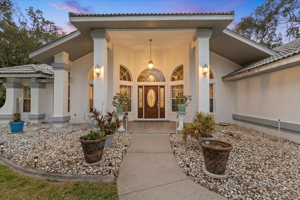 Photo of 74 Forest Wood Court, Spring Hill, FL 34609 (MLS # W7879349)