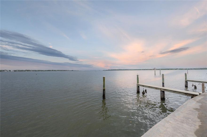 Are you dreaming of your own stylish urban OASIS surrounded by nature yet minutes from everywhere you want to be? Experience effortless coastal living in this exceptional waterfront townhome, perfectly designed for those who appreciate space, light and direct access to the water. Featuring two private boat slips, this residence offers a RARE opportunity to keep your vessels close and enjoy days on the water at a moment's notice. Inside, the home unfolds into an open, light-filled floor plan enhanced by soaring high ceilings and expansive windows that invite natural light throughout the day. The seemless flow between living, dining, and kitchen spaces creates an ideal setting for both RELAXED everyday LIVING and entertaining. Water views provide a constantly changing backdrop, adding a sense of CALM and CONNECTION to the outdoors. The generous layout offers flexibility for hosting family and guests, while the airy ceiling heights add architectural drama and a sense of openness rarely found in townhome living. Whether you're enjoying quiet mornings with coffee by the water or gathering with friends after a day on the boat, this home adapts effortlessly to your lifestyle. Outdoor living is just as compelling, with immediate access to the waterfront and your own boat slips just steps away - perfect for boating, paddleboarding, or sunset cruises. This is a home that blends convenience and luxury, offering the maintenance ease of a townhome with the experience of a private gated waterfront retreat. Ideally suited as a primary residence or a refined second home, this property delivers the best of waterfront living - space, light, and direct access to the water- all in one elegant package.