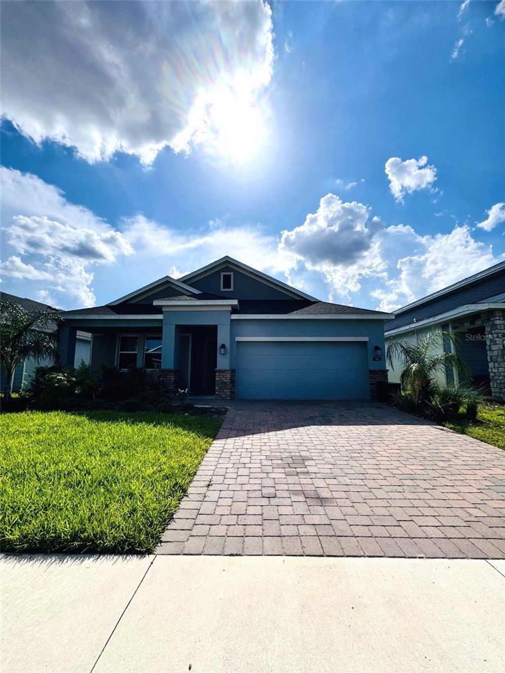 Photo of 142 Aces High Ln, Davenport, FL 33896 (MLS # O6374705)