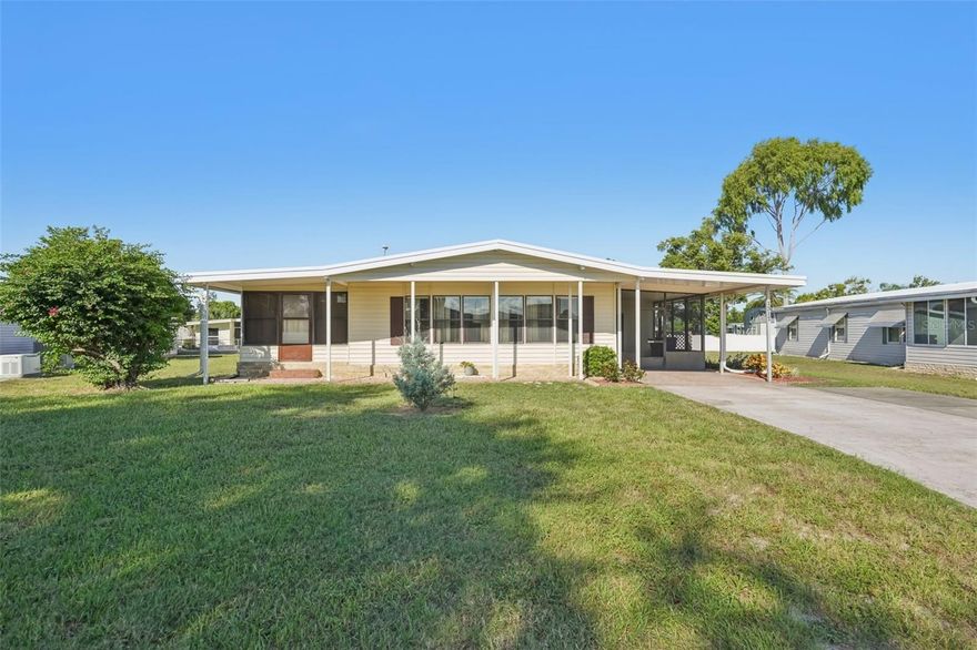 This 2-bedroom, 2-bath manufactured home offers a true Florida lifestyle in the sought-after community of Lake Frances Estates. The kitchen features abundant cabinetry, tile flooring, ceiling fan, all appliances, and an exhaust fan. Just off the kitchen, the dining area includes built-in cabinetry and flows into a spacious living room, which opens to a bright Florida room with its own window A/C and private entrance.

Both bedrooms include tile flooring, ceiling fans, and double closets. The primary suite offers a walk-in shower, while the guest bath provides a full tub and a large closet. Pull-down blinds are found throughout the home for added convenience.

Outside, the carport leads to a welcoming sunroom and a large laundry/storage room with plenty of cabinets. The central A/C unit is approximately 7 years old, and the roof has a protective roof-over.

Lake Frances Estates offers a wealth of amenities, including a pool, fishing pier, boat dock, and more. Conveniently located near Mount Dora, Eustis, and Tavares, this home combines comfort, convenience, and community living.