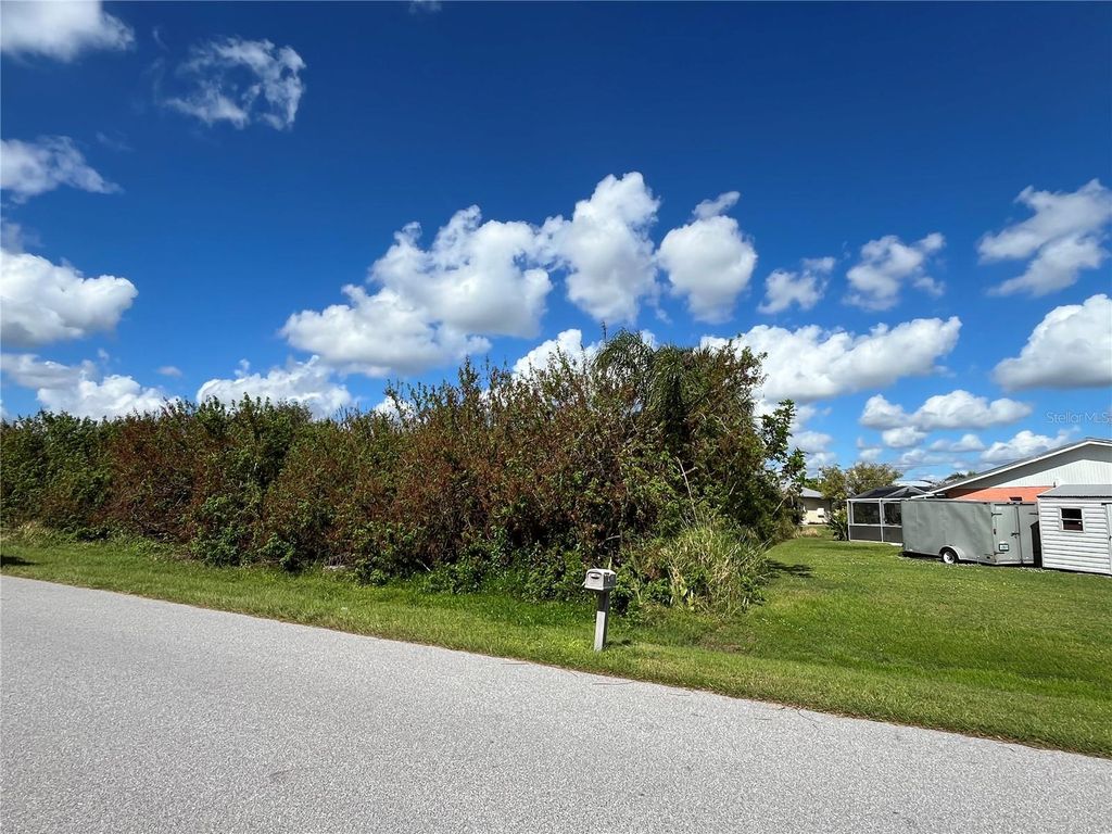 Photo of 520 Fenton Avenue NW, Port Charlotte, FL 33952 (MLS # C7500280)