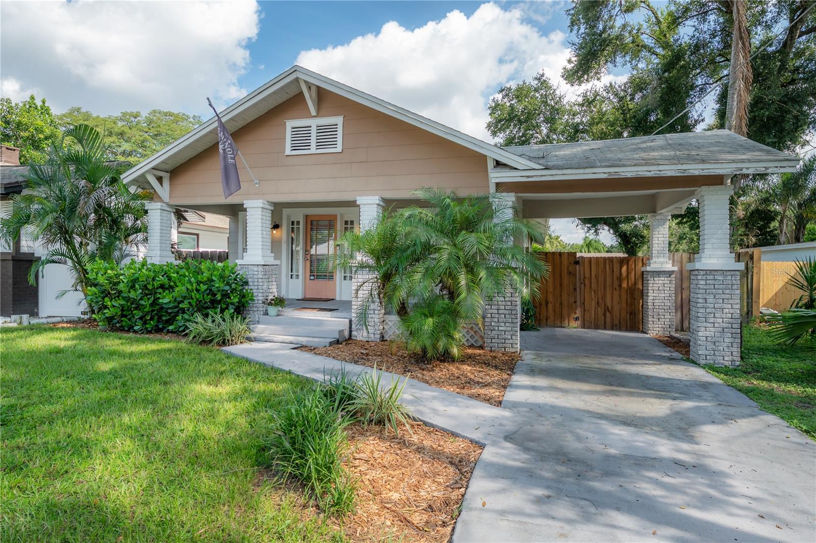 Nestled in the heart of Seminole Heights, this delightful 1920s bungalow exudes historic charm and instant curb appeal. The inviting front porch sets a welcoming tone and leads into a bright, open floor plan accented by abundant natural light this home offers walkability and easy access to Tampa’s best spots—think the Riverwalk, Armature Works, parks, bars, and local eateries.
Residents enjoy the mix of historic appeal and vibrant urban lifestyle that defines Old Seminole Heights, centrally located in Tampa this area offers both quite charm and convenience.
The home offers 3 bedrooms and 2 full baths, with a split layout that offers privacy—particularly for the primary suite. Tucked away for tranquility, it includes an updated en-suite bathroom with designer tile and a walk-in shower.
Kitchen: Upgraded with granite countertops, wood cabinetry, stainless steel appliances, and an eat-in nook—perfect for casual meals or socializing as meals are prepared. Set on a 5,200 sq ft lot, the home includes a custom back deck, newly installed irrigation system, fresh sod, and landscaping. Fully fenced with an outdoor storage shed.