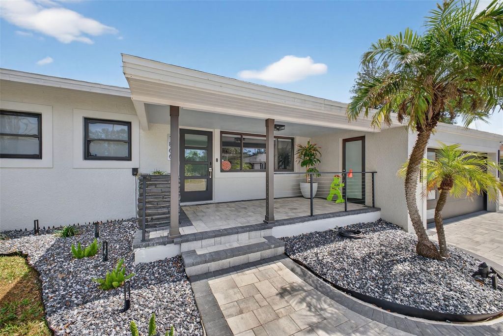 Photo of 1866 Venetian Point Drive, Clearwater, FL 33755 (MLS # TB8489361)