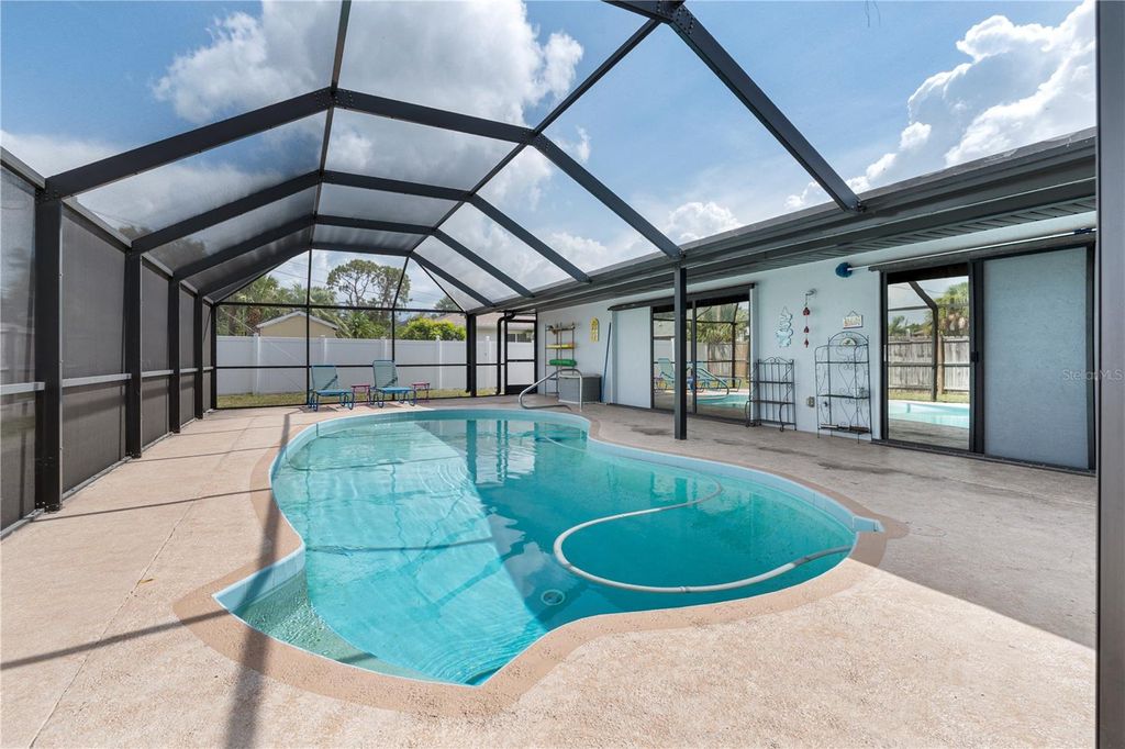 Photo of 1041 S Salford Boulevard, North Port, FL 34287 (MLS # C7510751)