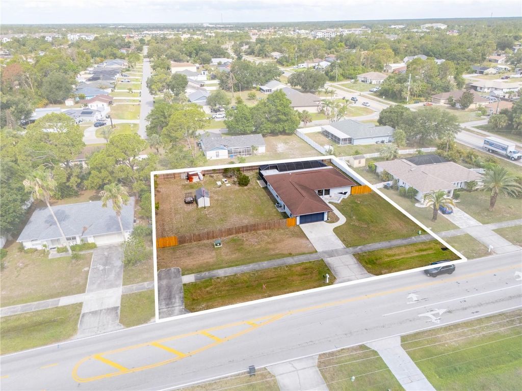 Photo of 1041 S Salford Boulevard, North Port, FL 34287 (MLS # C7510751)