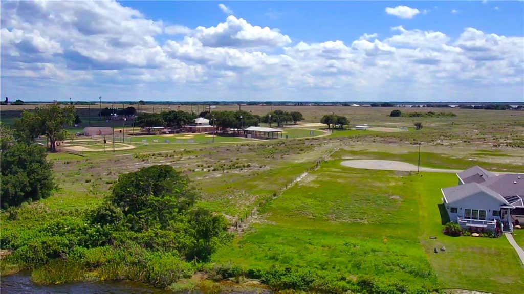 Photo of 466 Sunset Pointe Drive, Lake Placid, FL 33852 (MLS # TB8519069)