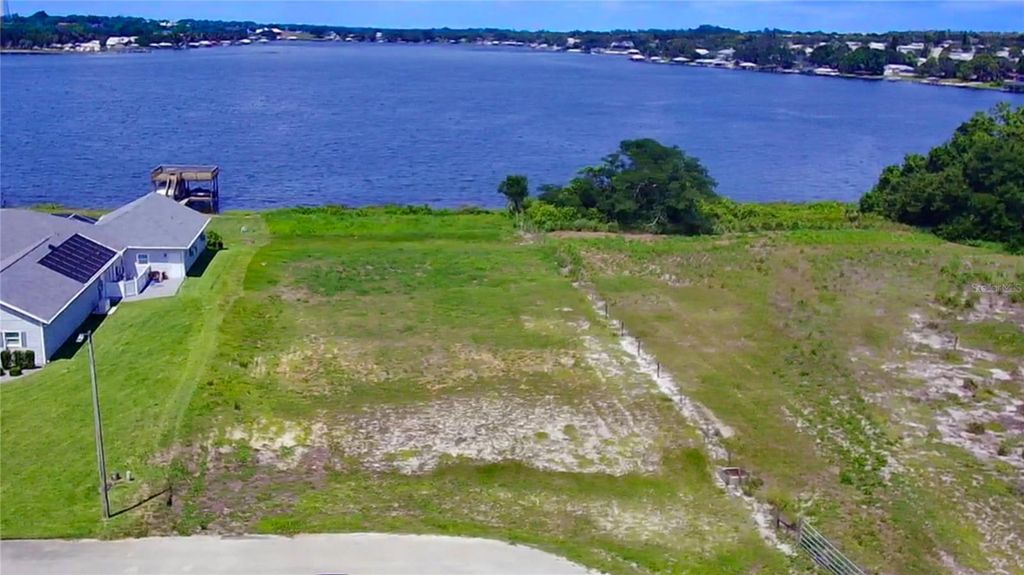 Photo of 466 Sunset Pointe Drive, Lake Placid, FL 33852 (MLS # TB8519069)