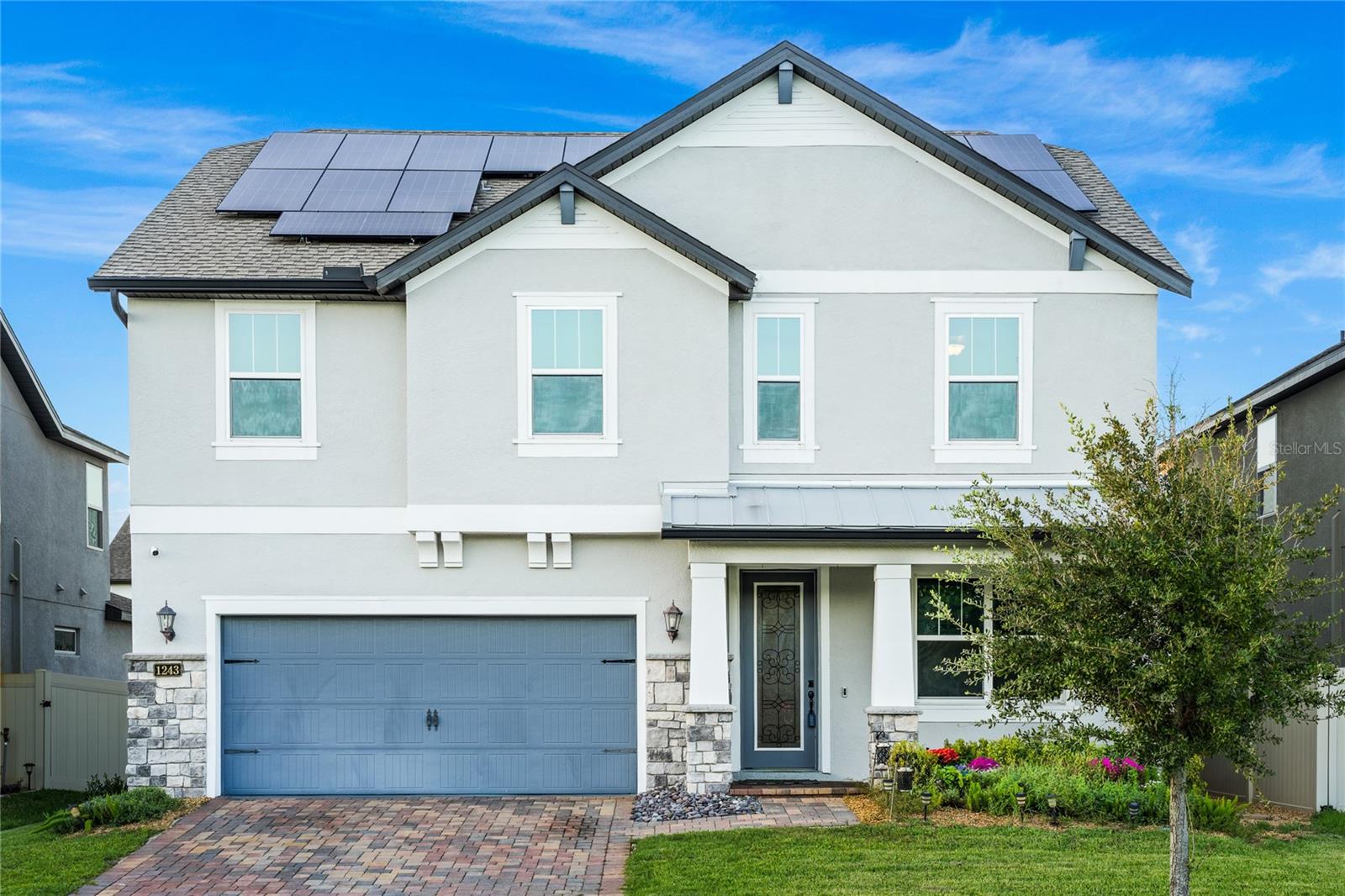 Welcome to your DREAM ORLANDO OASIS! This beautifully designed 4 bed 2.5 bath SMART HOME offers both SPACE and STYLE, complemented by MODERN UPGRADES that make it a TRUE GEM. As you enter through the PAVER DRIVEWAY and step into the foyer, you'll be greeted by a DEDICATED OFFICE SPACE with elegant FRENCH DOORS—an ideal spot for productive work or creative inspiration. The heart of the home opens up to reveal an inviting OPEN FLOOR PLAN that seamlessly connects the kitchen dining area, and living room. Abundant NATURAL LIGHT bathes the interior through THREE LARGE WINDOWS and a convenient slider door to the stunning AIR CONDITIONED GLASS SUNROOM. This versatile space invites the outdoors in, providing breathtaking views of the VERY LARGE FENCED BACKYARD. The kitchen is a culinary enthusiasts dream, boasting sleek QUARTZ COUNTERTOPS, STAINLESS STEEL APPLIANCES, and ample COOKING SPACE centered around a convenient ISLAND. The culinary journey is made even more delightful by the added LUXURY of BRAND NEW WOOD LOOK VINYL FLOORING that complements the entire home. STORAGE will never be an issue, with a GENEROUSLY SIZED PANTRY or STORAGE SPACE conveniently located off the garage. A thoughtfully placed half bath on the main level ensures convenience for your guests. Ascending the stairs, you'll find all FOUR BEDROOMS thoughtfully positioned for privacy and COMFORT. The UPSTAIRS AREA adds an additional of versitility, allowing you to tailor this space to your specific needs whether it's an ADDITIONAL FAMILY ROOM, KIDS PLAY AREA, or ENTERTAINMENT SPACE. The SPACIOUS PRIMARY BEDROOM is a TRUE RETREAT, separate from the other bedrooms, and comes complete with a COMFORTABLE ENSUITE MASTER BATH and a SIZEABLE WALK-IN CLOSET for all your STORAGE NEEDS. Conveniently located near the 408 HIGHWAY and the VIBRANT SHOPPING SCENE of WATERFORD LAKES, this home offers the PERFECT BLEND of TRANQUILITY and ACCESSIBILITY. DON'T MISS this OPPORTUNITY to make this METICULOUSLY CARED-FOR HOUSE your FOREVER HOME. SCHEDULE A SHOWING TODAY and experience the TRUE ESSENCE of ORLANDO LIVING at its FINEST!