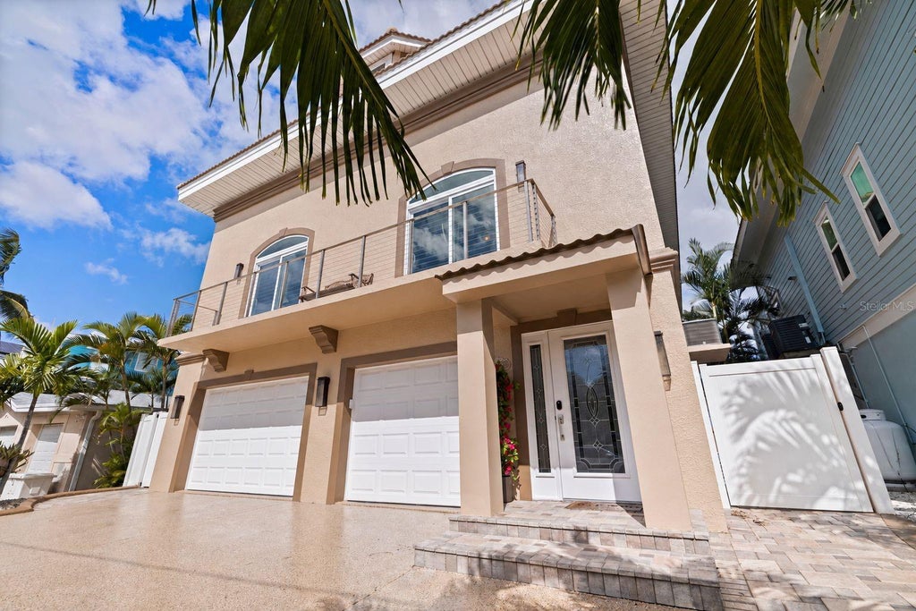 Photo of 13009 Boca Ciega Avenue, Madeira Beach, FL 33708 (MLS # TB8559397)