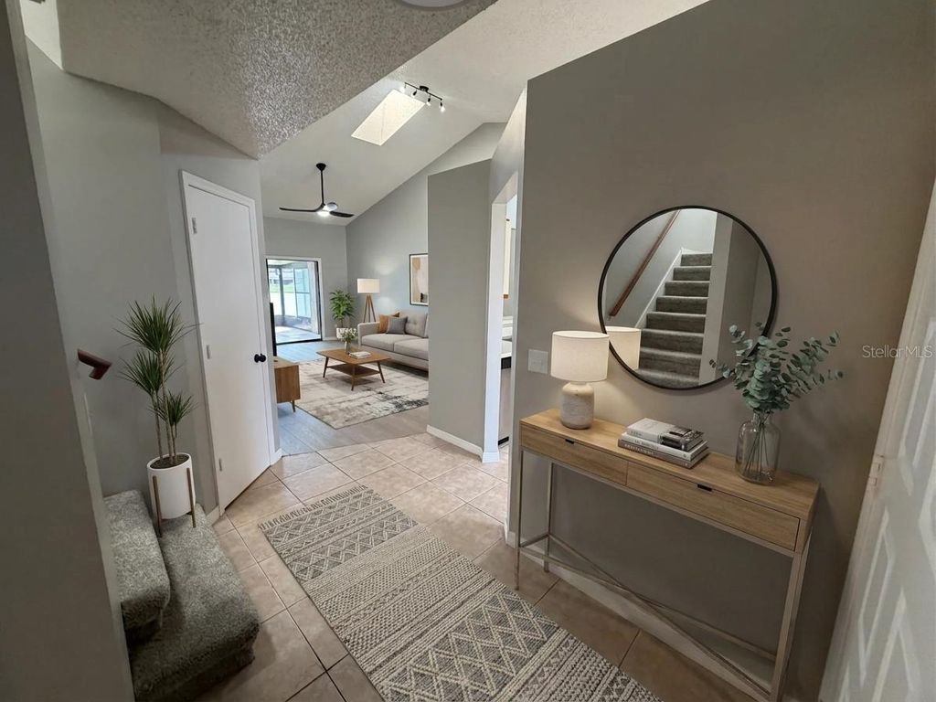 Photo of 50 Lakepointe Circle, Kissimmee, FL 34743 (MLS # O6401506)