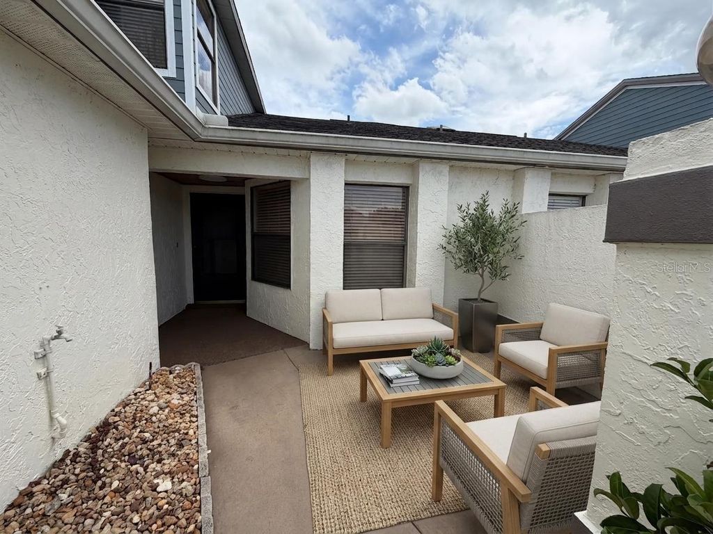 Photo of 50 Lakepointe Circle, Kissimmee, FL 34743 (MLS # O6401506)