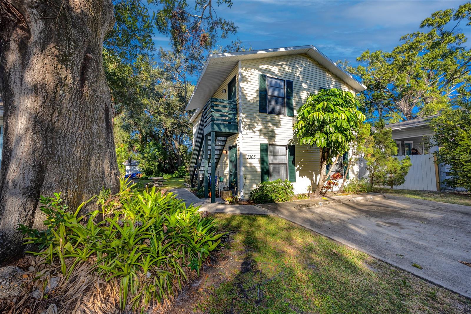 ANNUAL RENTAL -Welcome to this bright and spacious 2-bedroom, 1-bath top-floor duplex in Tampa’s desirable Bayshore Gardens area. This charming home offers privacy, natural light, easy care tile throughout, closet organizers, and a comfortable layout. Lots of storage in the unit, granite countertops, a new refrigerator, full-sized washer & dryer, and a large shared backyard with picnic table for all to enjoy the outdoors. One assigned parking spot and freshly painted inside and out. Enjoy the convenience of being just minutes from local restaurants, cafes, and shops, with easy access to Bayshore Boulevard, Hyde Park, and downtown Tampa. Zoned for top-rated schools and set in a walkable, vibrant neighborhood, this home combines comfort, location, and lifestyle in one inviting package. Pet friendly--one cat allowed. Sewer, water, trash, and lawn care are included in the rent. All other utilities are the tenant's responsibility. Application fee of $65/person over the age of 18 is required. Upon approval, a $100 tenant processing fee, $2,200 security deposit, and first month’s rent is due. Tenant Concierge Program required and includes air filters, credit repair, tenant insurance, and liability coverage at $45/month.