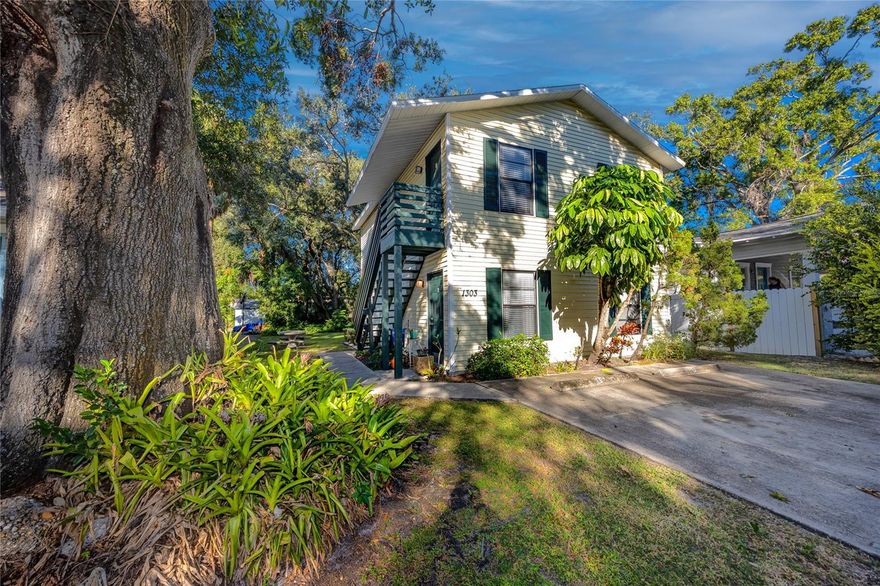 ANNUAL RENTAL -Welcome to this  bright and spacious 2-bedroom, 1-bath top-floor duplex in Tampa’s desirable Bayshore Gardens area. This charming home offers privacy, natural light, easy care tile throughout, closet organizers, and a comfortable layout. Lots of storage in the unit, granite countertops, a new refrigerator, full-sized washer & dryer, and a large shared backyard with picnic table for all to enjoy the outdoors. One assigned parking spot and freshly painted inside and out. Enjoy the convenience of being just minutes from local restaurants, cafes, and shops, with easy access to Bayshore Boulevard, Hyde Park, and downtown Tampa. Zoned for top-rated schools and set in a walkable, vibrant neighborhood, this home combines comfort, location, and lifestyle in one inviting package. Pet friendly--one cat allowed. Sewer, water, trash, and lawn care are included in the rent. All other utilities are the tenant's responsibility. Application fee of $65/person over the age of 18 is required. Upon approval, a $100 tenant processing fee, $2,200 security deposit, and first month’s rent is due. Tenant Concierge Program required and includes air filters, credit repair, tenant insurance, and liability coverage at $45/month.