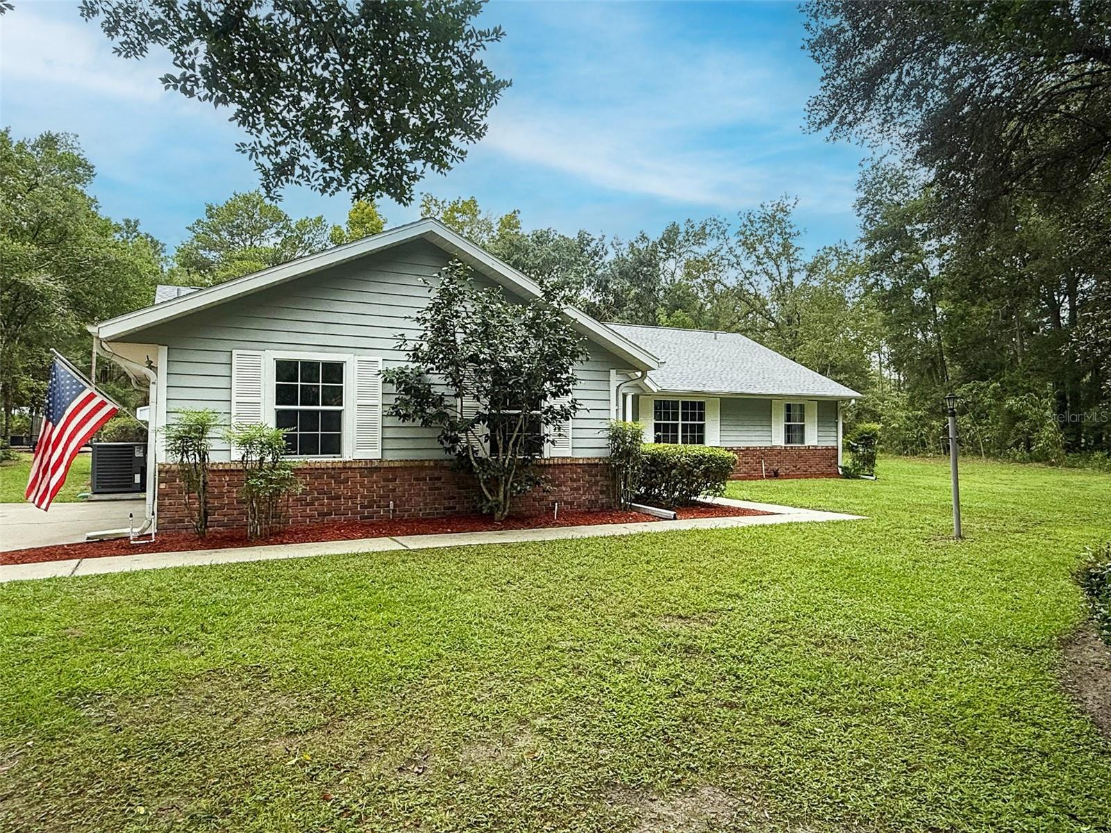Beautifully maintained 3-bedroom, 2-bath ranch-style home offering 1,868 sq. ft. of living space on 1.04 acres. The property features upgraded kitchen and bathrooms with new fixtures, stainless steel appliances, wood cabinetry, roof 2023, A/C 2023 and duct work 2024. Interior highlights include wood and tile flooring throughout, ceiling fans, and a spacious screened lanai with tile flooring. A 2-car garage provides additional convenience.
Located in the desirable Rainbow Springs community, residents enjoy access to a clubhouse, swimming pool, tennis courts, billiards room, fitness center, and shuffleboard. The community also offers exclusive access to the private residents-only beach on the Rainbow River, complete with a kayak launch, picnic pavilion, and restrooms. This home combines comfort, modern upgrades, and exceptional recreational amenities in one of Florida’s most sought-after natural settings.