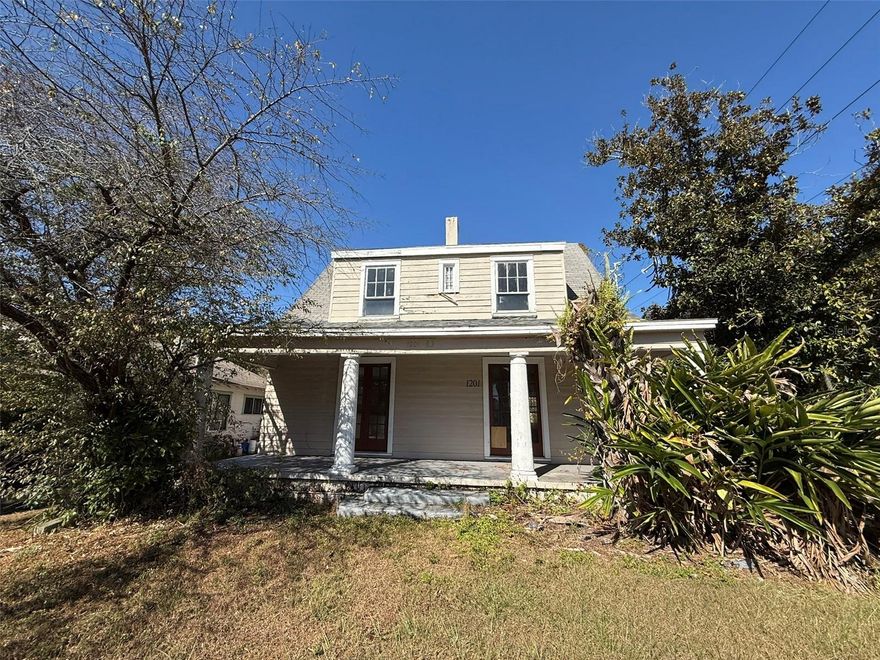 Historic 2-Story Bungalow located in central Lakeland. The home offers 2 bedrooms and 1.5 bathrooms. Situated on corner lot. Storage room off carport includes a washer/dryer connection. House in need of repairs/restoration. SELLER has NO knowledge of history or condition. All buyers must be accompanied in by a representing RE agent. All measurements are estimates. Home is in close proximity to shopping, dining, and major highways. Property is sold as-is with no repairs, or property disclosures.