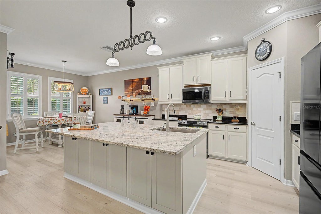 Photo of 10427 Hyannisport Loop, San Antonio, FL 33576 (MLS # TB8544468)