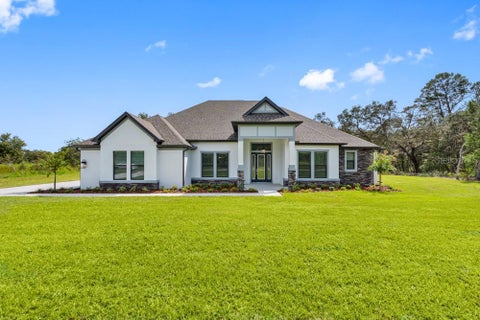 Photo of 17521 Lippizan Lane, Hudson, FL 34667 (MLS # TB8538512)