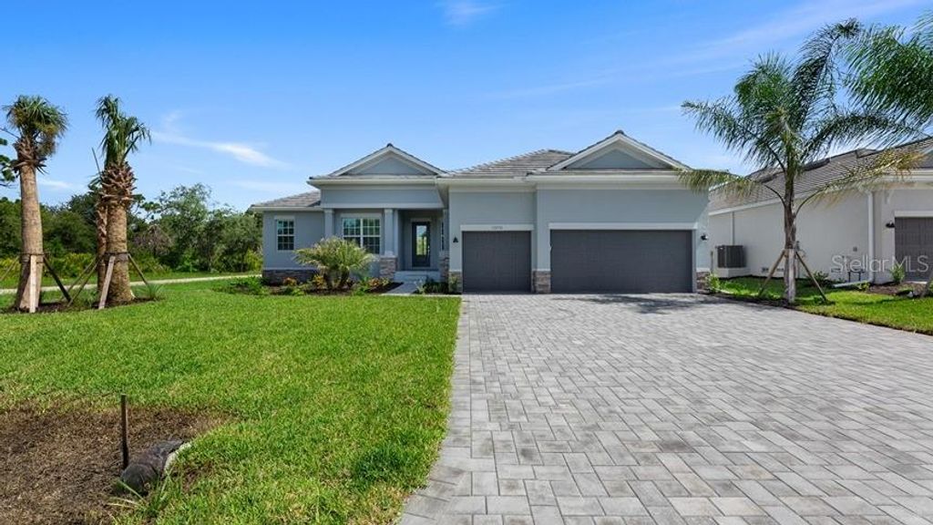 Photo of 9275 Canna Street, Port Charlotte, FL 33981 (MLS # TB8423740)