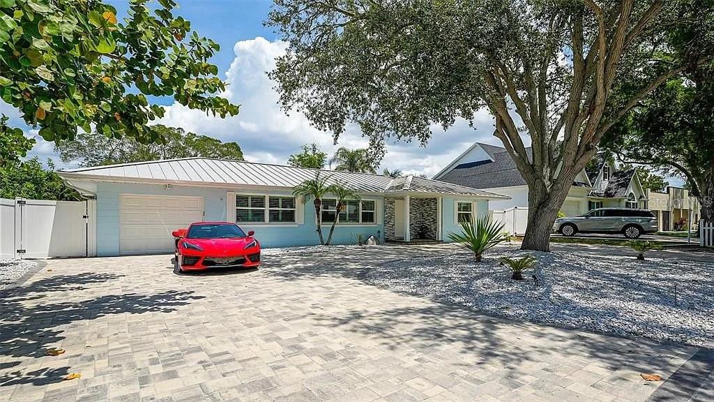 Modern luxury meets Florida beach house style in this impeccably renovated residence, located in the highly sought-after “West of the Trail” enclave — just minutes from Siesta Key’s world-renowned beaches and Downtown Sarasota’s cultural district.
This designer 3-bedroom, 2-bath home offers nearly 1,900 square feet of refined interior space, thoughtfully reimagined for both elegant living and effortless entertaining. Clean lines, curated finishes, and a sunlit open layout set the tone throughout — blending coastal ease with upscale detail.
Step outside and discover your own private resort-style oasis, featuring a sparkling pool, ambient lighting, and multiple lounging and dining areas — all surrounded by maintenance-free landscaping for year-round enjoyment. An EV charging station adds modern convenience, and there’s no HOA to limit your lifestyle or income strategy.
Currently operated as a successful Airbnb by a 5-star Superhost, this home offers outstanding flexibility for the right buyer — whether as a seasonal retreat, full-time residence, or high-end rental investment.
A rare offering in one of Sarasota's most desirable neighborhoods — polished, private, and prepared for its next chapter.