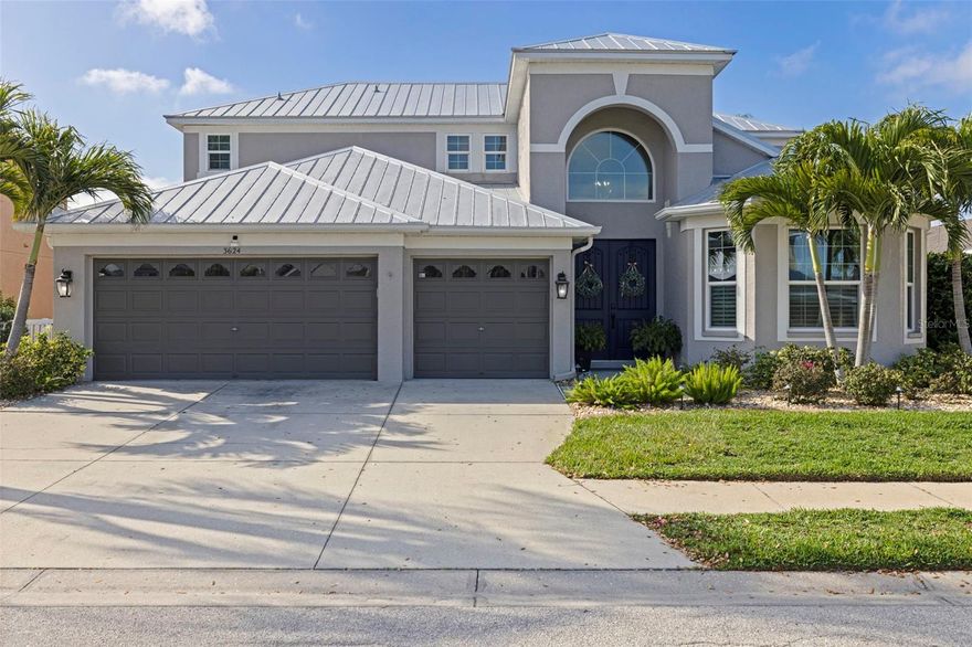 Beautiful waterfront canal home with easy access to the Manatee River. Conveniently located between I75 and downtown Bradenton. Upon entry, you will be greeted by an open floorplan with views of the screen-closed pool and spa in the backyard. Custom tiles have been installed on the entire main level as well as the second floor bathrooms. All kitchen and bathroom cabinets have been upgraded including countertops. Samsung smart appliances include stove, microwave, and dishwasher. The first-floor primary bedroom has an updated shower and bath tub. Natural gas has been added to the home. Other smart home appliances include thermostats, garage doors, and Pentair pool equipment. The house has hurricane impact rated windows and doors, a newer metal roof and a backup whole-house 20KW generator. Large sliding glass doors in the living room invite you to cool off in the pool/spa finished with Pebble Tech, custom glass tiles and travertine decking. Enjoy the calm waters of the deep canal in your backyard through the "picture window" screen porch. A boater's paradise with a new 13,000 pound lift, upgraded aluminum bunks and a new boat canopy. The dock was updated with composite decking and an outdoor shower.