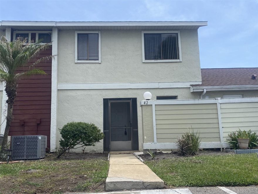 Beautiful 2 story Townhouse with a canal view!! Original owners and very well maintained property. Great floor plan that offers a living/dining room combination connecting to the screened porch and the peaceful view of the backyard, great for entertaining friends and family. The fully equipped kitchen has lots of cabinet space, closet pantry, all newer appliances, eat-in space, and breakfast bar. The large primary bedroom offers a big walk-in closet and a spacious en-suite bathroom with split dual sinks and tub with shower. Primary bedroom downstairs, two additional bedrooms and second bathroom upstairs. Laundry room closet is located on second floor, ceramic title throughout the first floor, carpet upstairs, high ceilings, roof installed in 2016. Spacious screened back porch. Conveniently located - take a short walk to shopping, dining, banks, and gym. You will have easy access to FL Turnpike, 417, and Orlando International Airport (MCO), only minutes to all area major attractions. Must see!!
